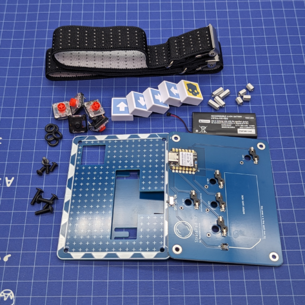 A disassembled view of the macropad with loose parts