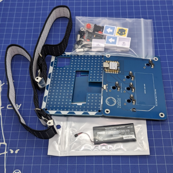 A disassembled macropad of packaged parts