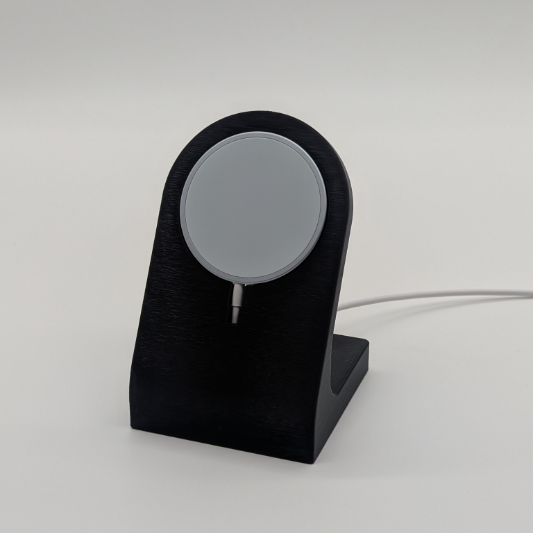 a 3d printed phone charging stand in black