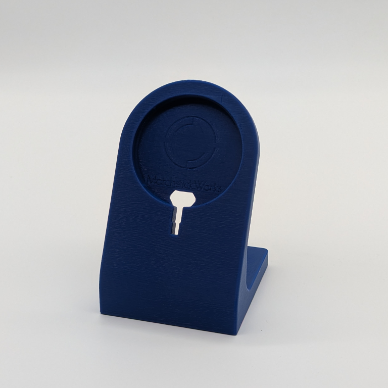 a 3d printed phone charging stand in blue